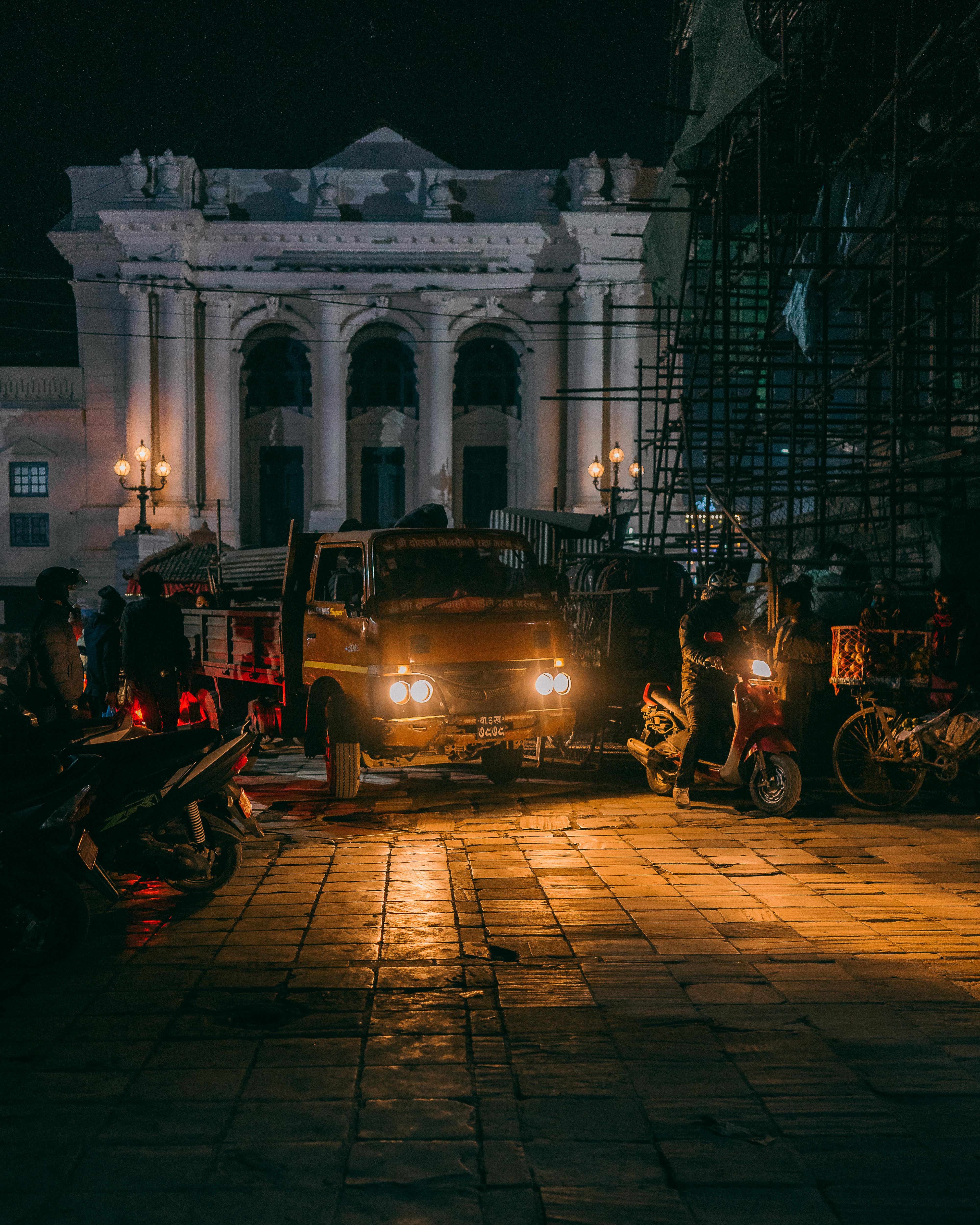 Person listening to an audiobook while painting miniatures