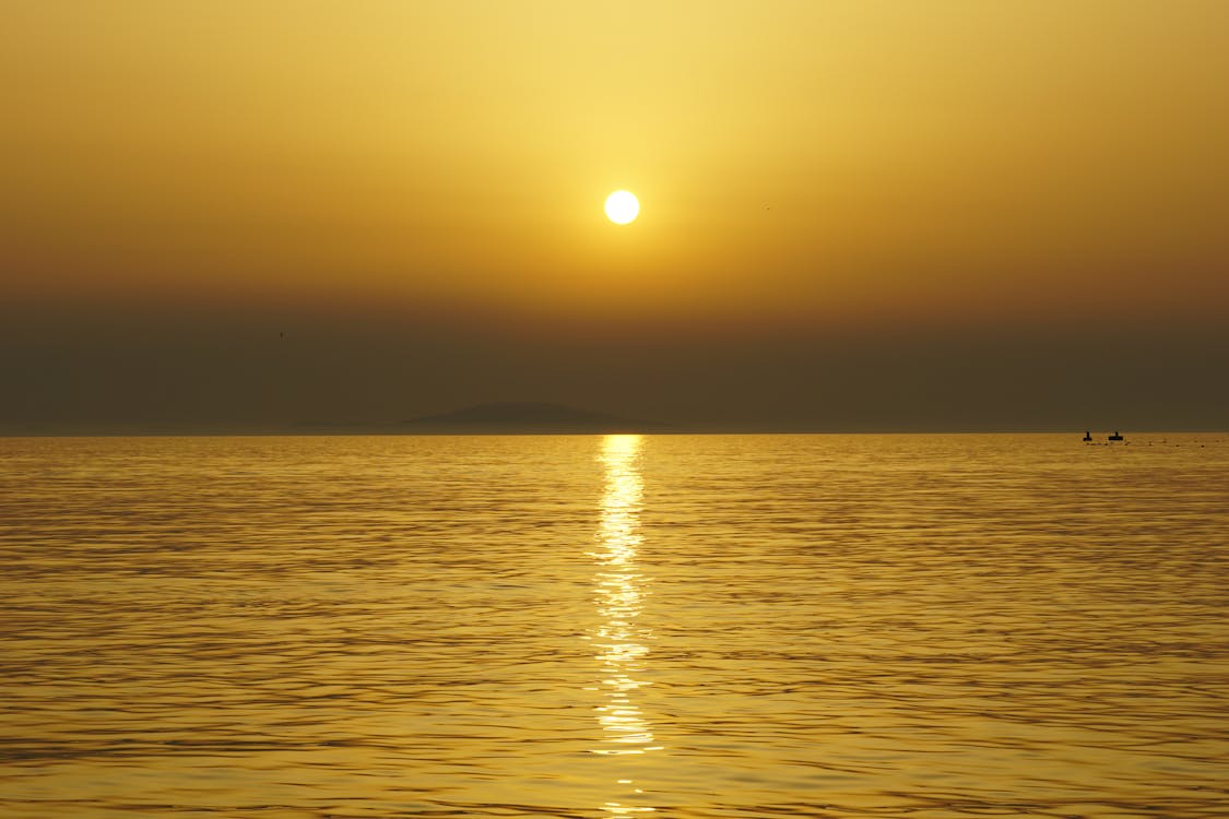 Sea Water during Sunset
