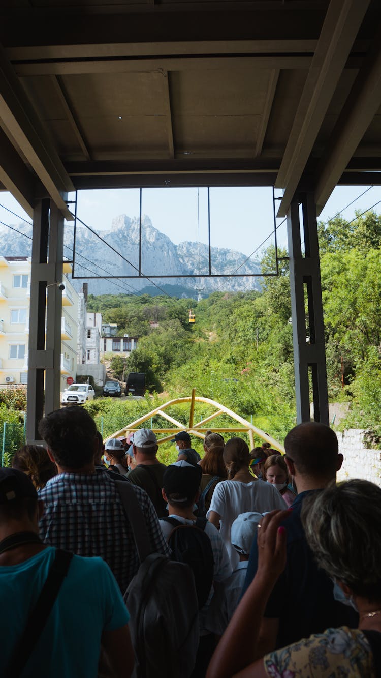 People Waiting In Line For The Cable Car In Salzburg 