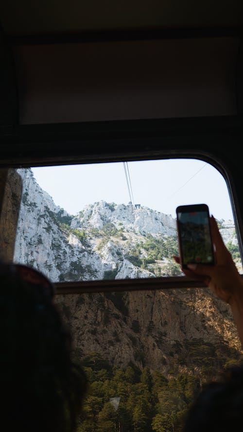 View of Rock Mountain from a Vehicle Window