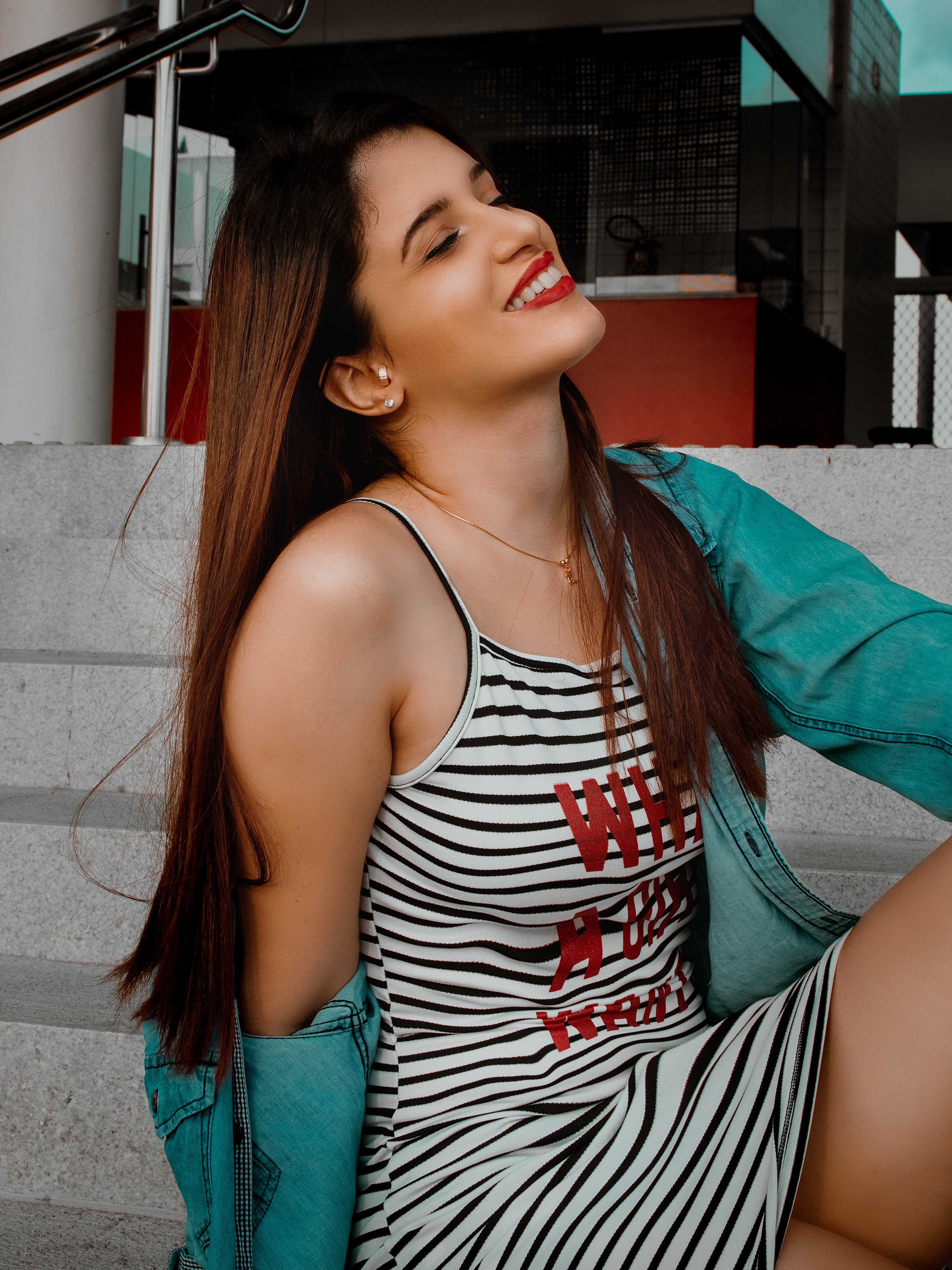 Woman in a Striped Dress · Free Stock Photo