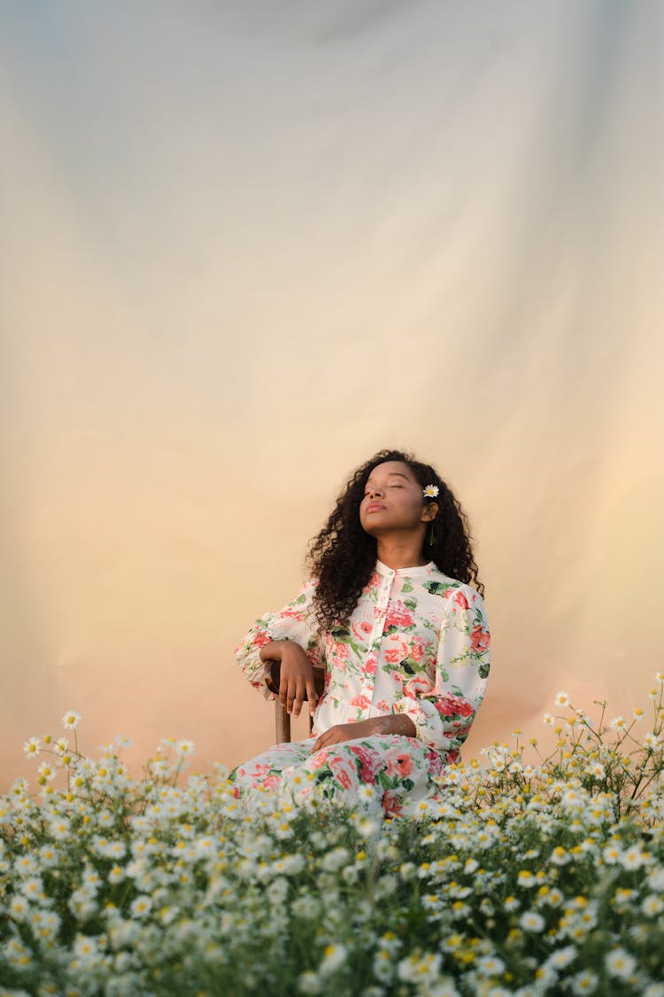 Young Woman On Flower Field 