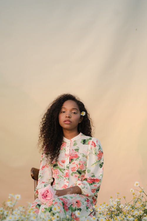 Young Woman on Flower Field 