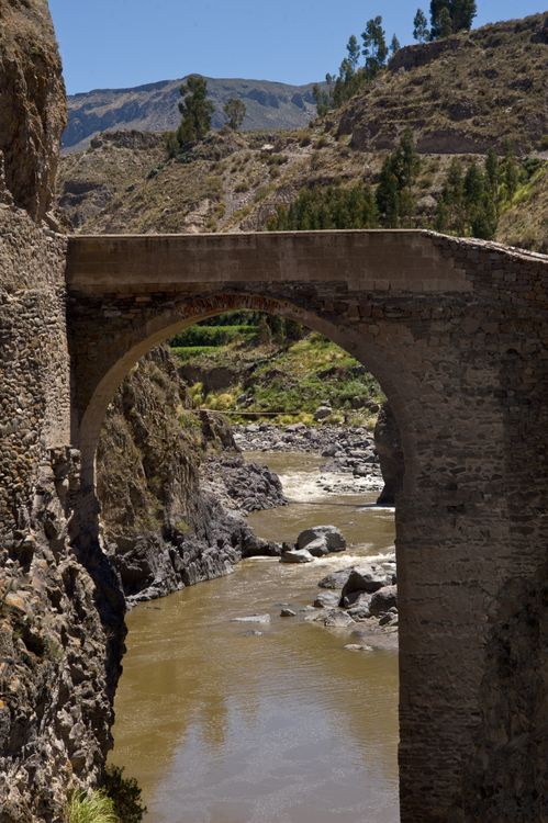 Concrete Arch Bridge over a River · Free Stock Photo