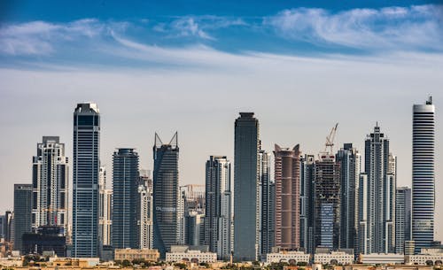 Photograph of a City Under a Blue Sky