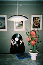 Person Holding Vinyl Record Covering Their Face