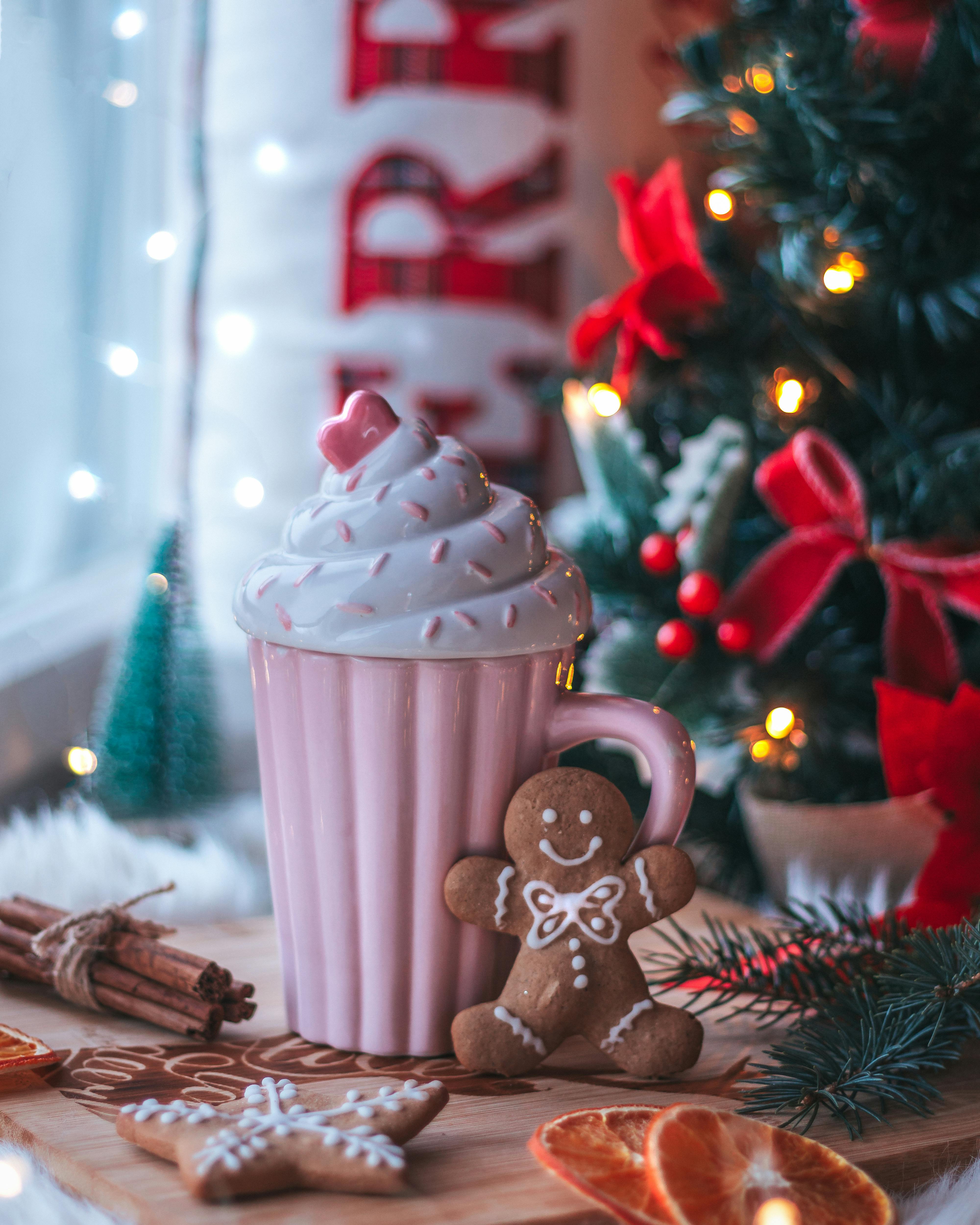 Christmas scene with hot cocoa and gingerbread, perfect for holiday mood.