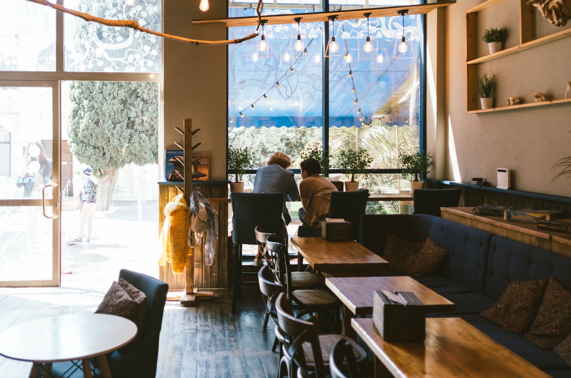 Espresso being pulled at an independent Albany coffee shop counter