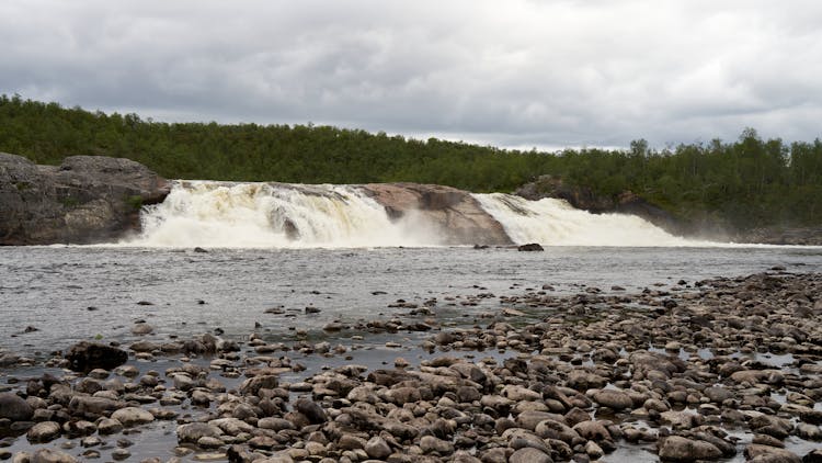 Cascade And Rocks In Stream