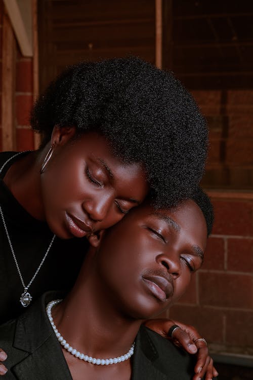 Free Two People Closing Their Eyes
 Stock Photo