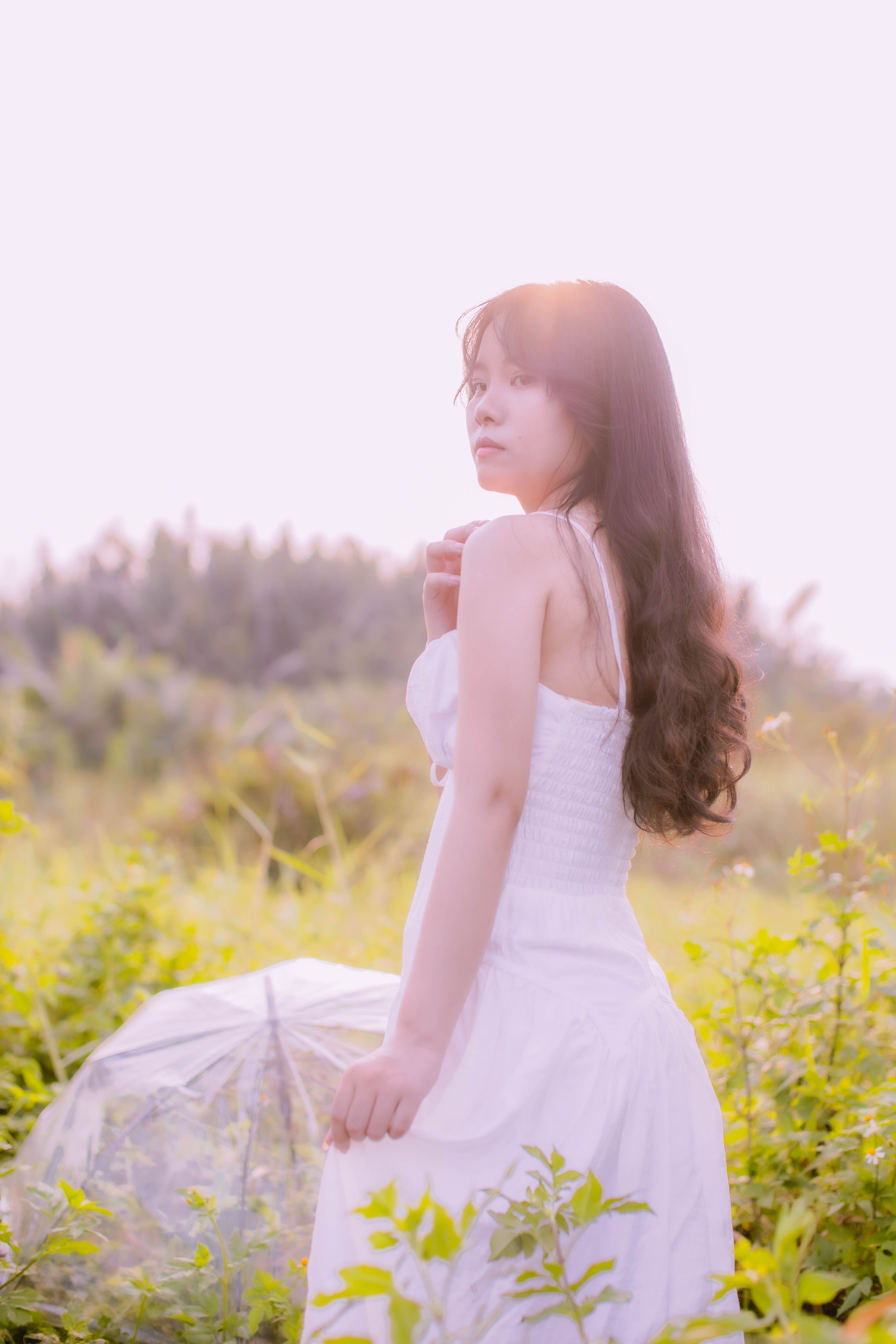 Woman Wearing Pink Dress Standing on Flower Garden · Free Stock Photo