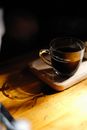 Clear Glass Mug with Coffee on Wooden Board