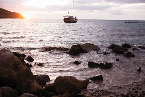 Boat Near a Rocky Seashore