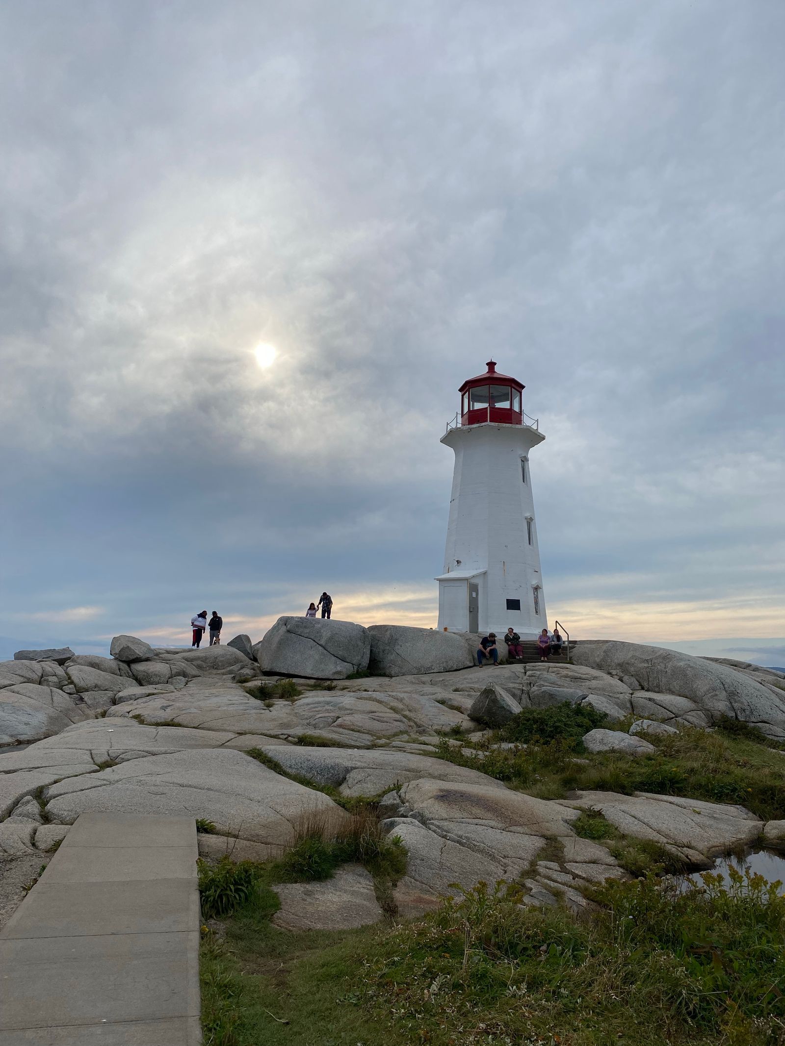 Peggy's Cove lighthouse on smooth granite outcrops in Nova Scotia