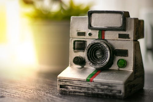 Free Photo of White Film Camera Miniature Stock Photo