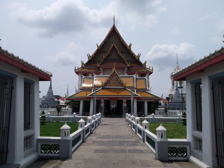 Explore the traditional Thai architecture of a temple in Wat Kanlaya, Thailand.