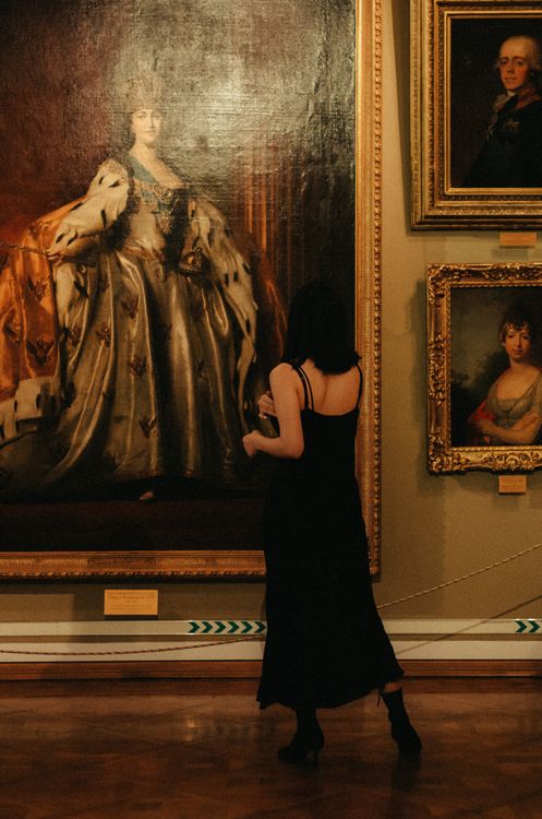 Woman in Black Dress Standing in Front of Painting Free Stock Photo Woman in Black Dress Standing in Front of Painting Free Stock Photo