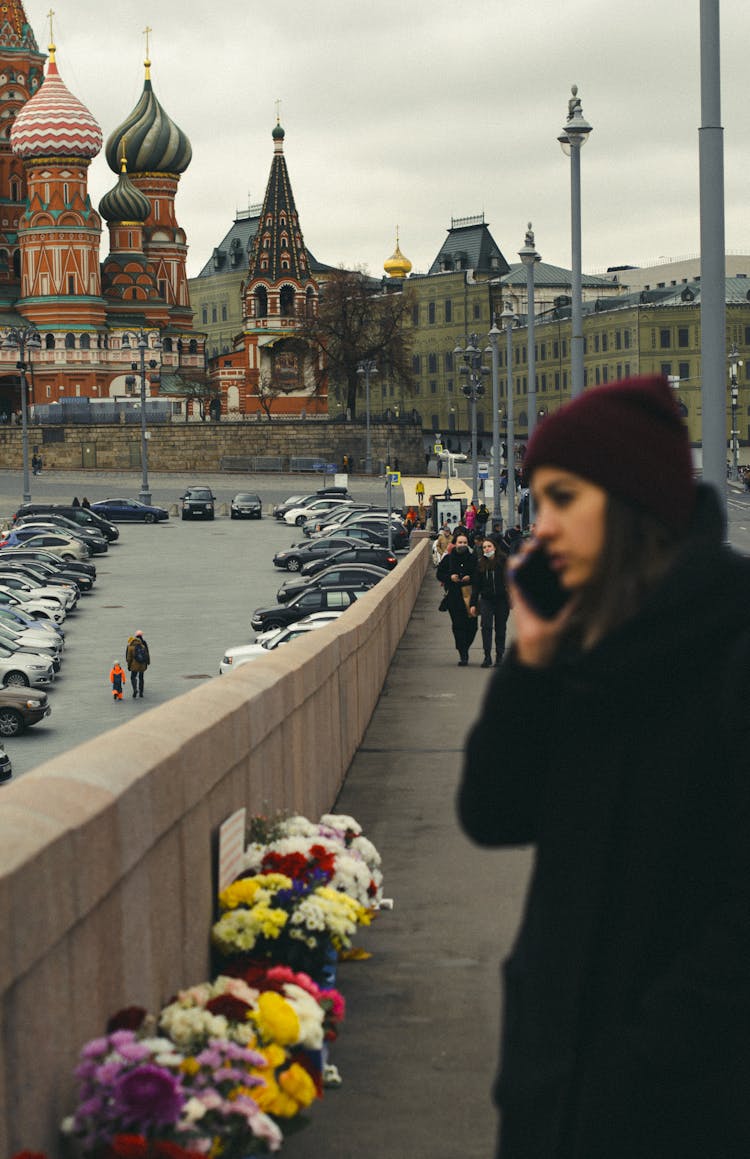 People Walking On A Bridge