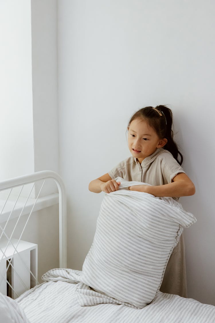 Girl Making Bed