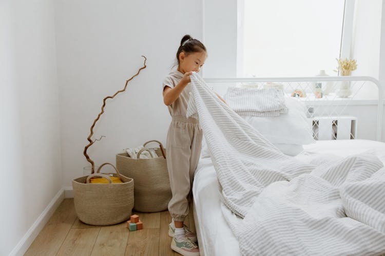 Girl Making Bed