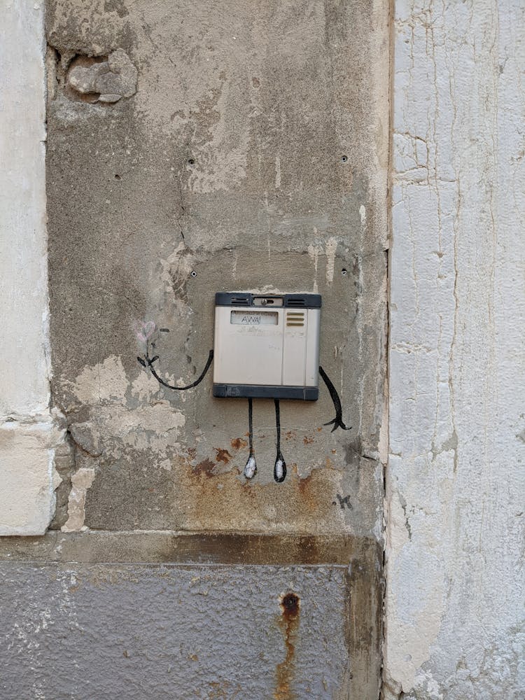 Intercom On A Destroyed Wall 