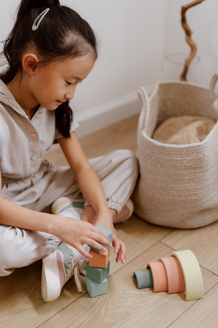 Girl Playing With Blocks