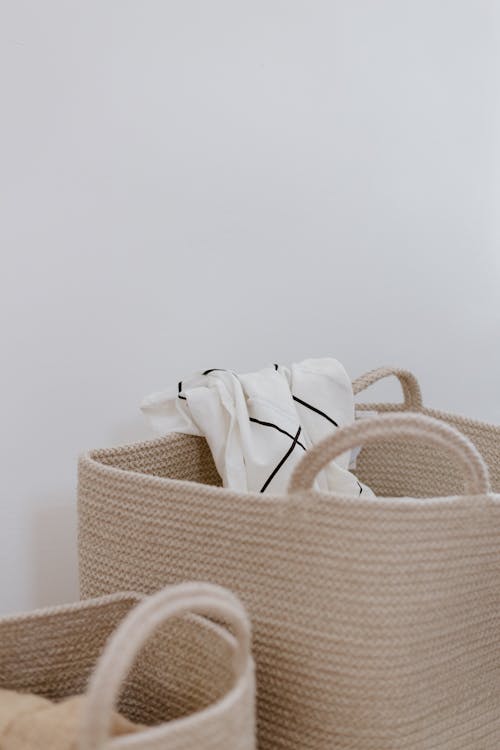 Free Bags with a Bed Linen Sticking Out from the Inside Stock Photo
