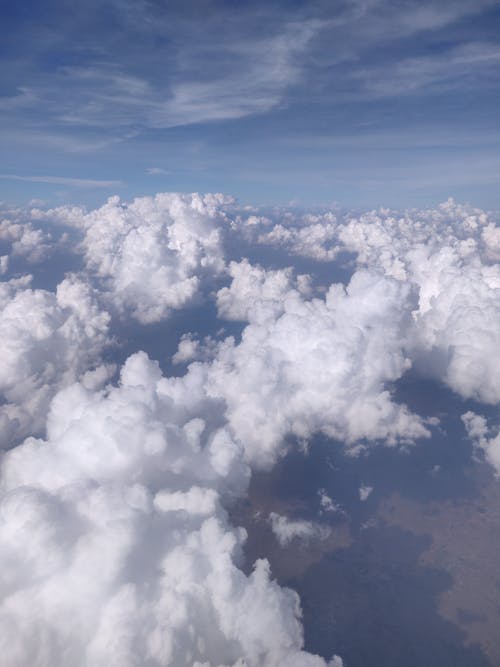 Foto profissional grátis de céu azul, cúmulos, forma de nuvens