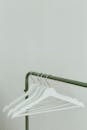 White Hangers on Clothing Rack