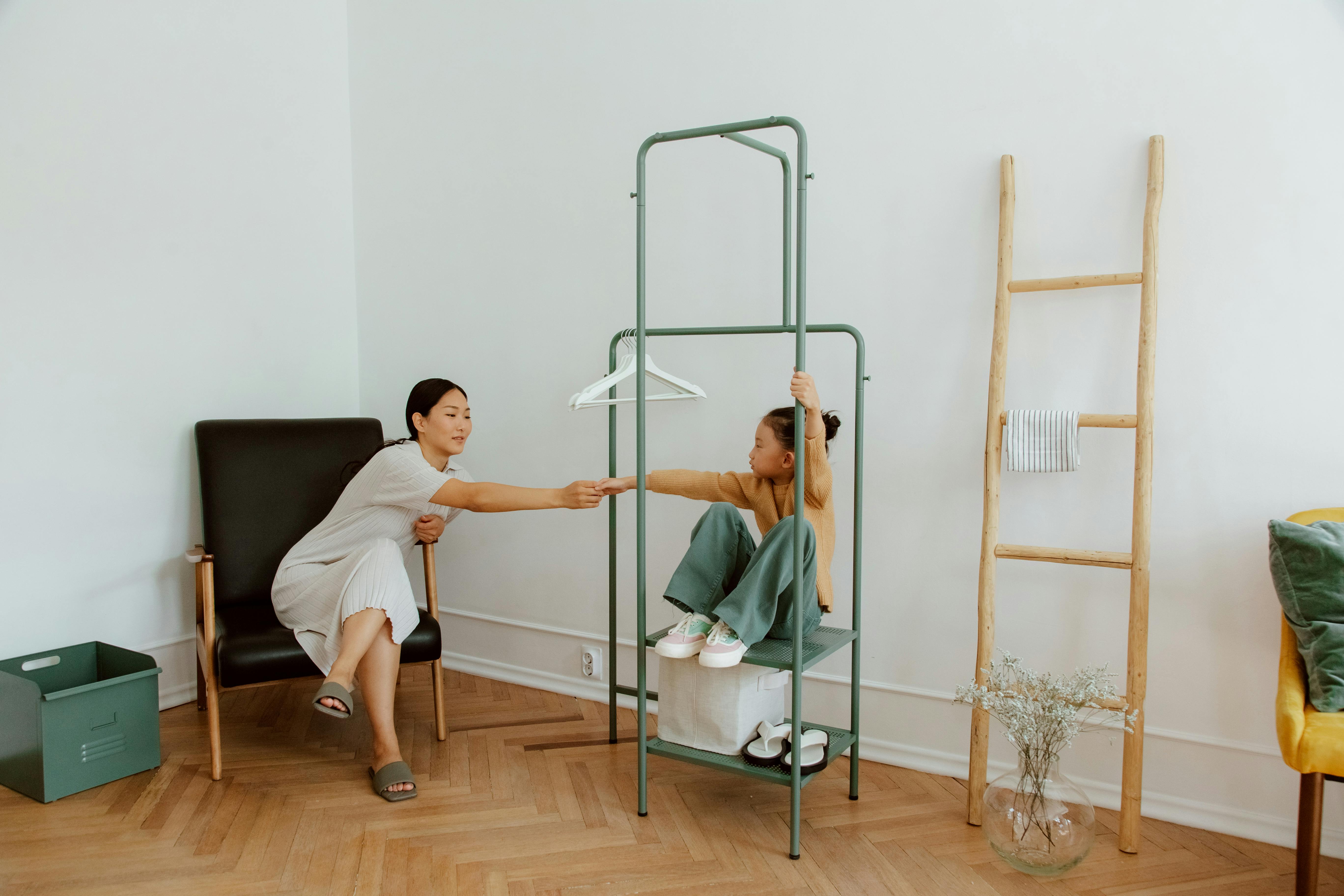 Mother and Daughter Shaking Hands · Free Stock Photo