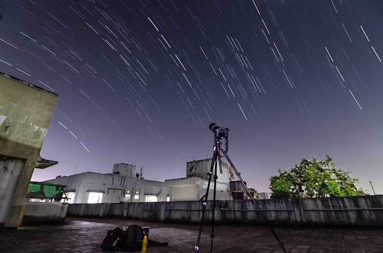 Camera On Tripod In Yard Pointed At Night Sky