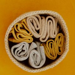 Rolled ribbed toddler socks in oat and ochre, photo by Ron Lach on Pexels