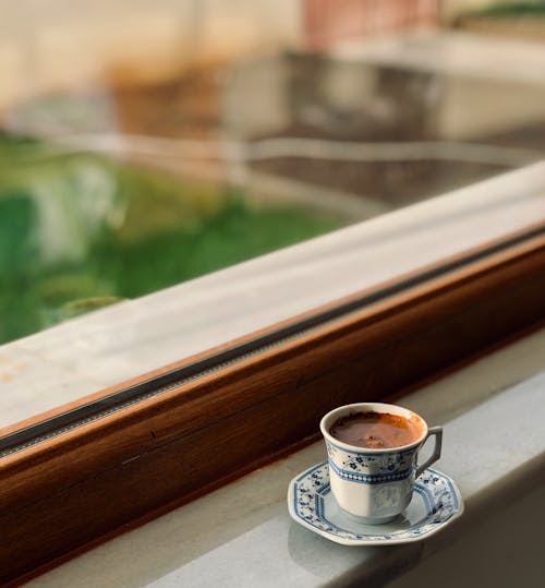Cup of Coffee on Windowsill