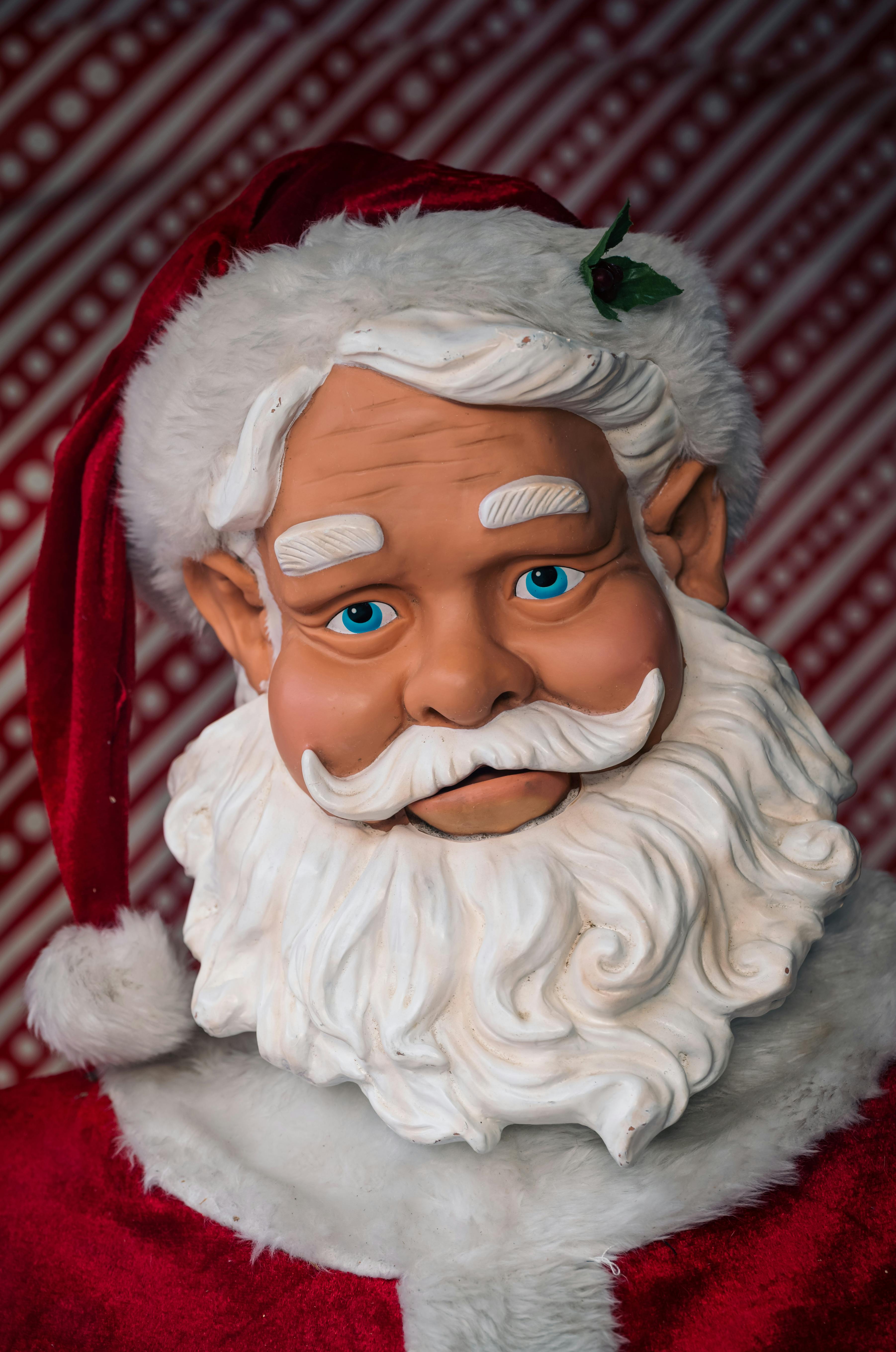 Red and White Ceramic Santa Claus Figurine · Free Stock Photo