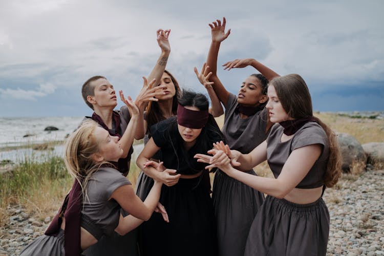 Group Of Women Dancing Together 