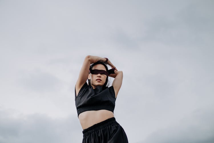 Woman Wearing A Crop Top And Blindfold