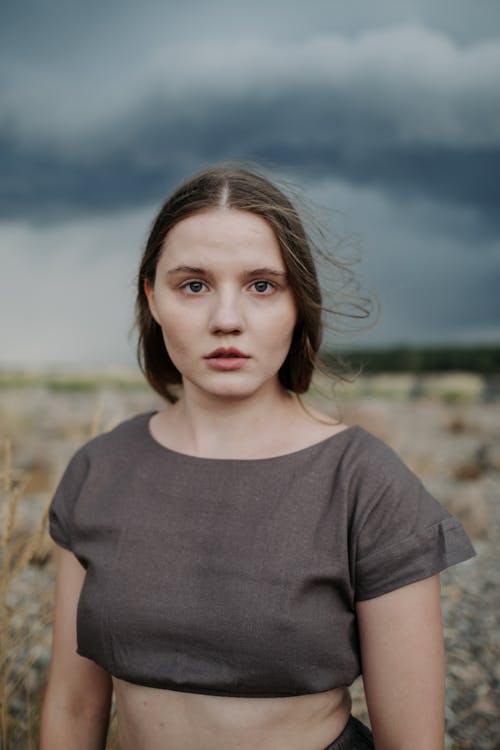 Portrait of a Woman Standing Outdoors