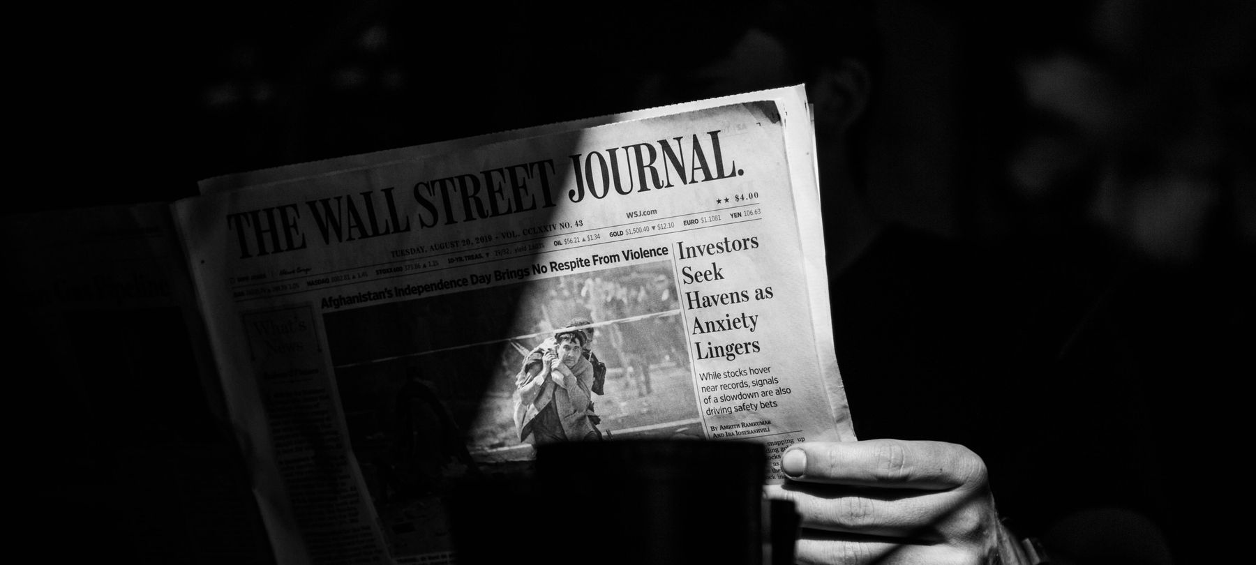 Editor reading and marking a story before publication