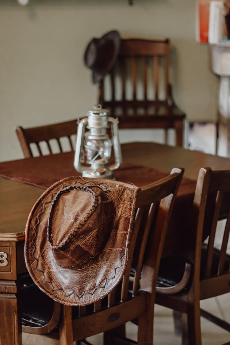 Leather Stetson Hat On Dining Chair