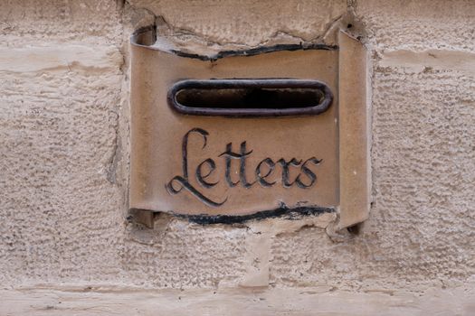 A Mailbox on a Wall