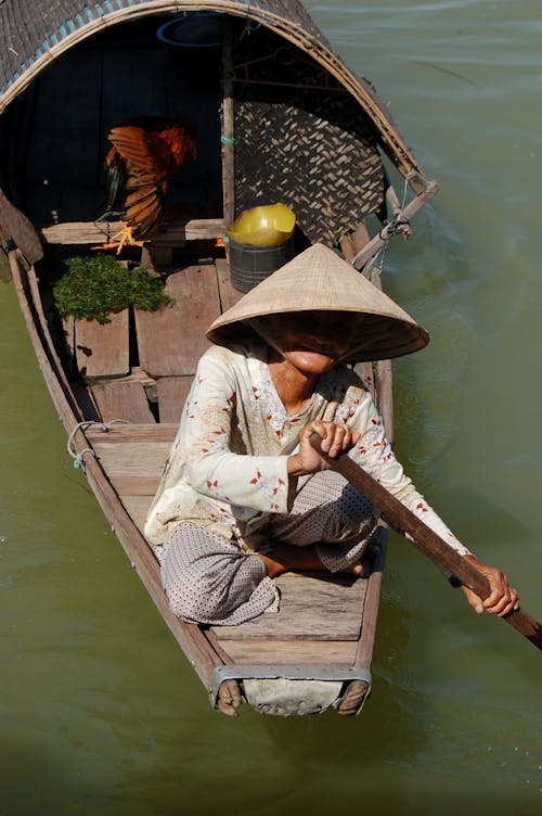 Photo of a Man on a Boat