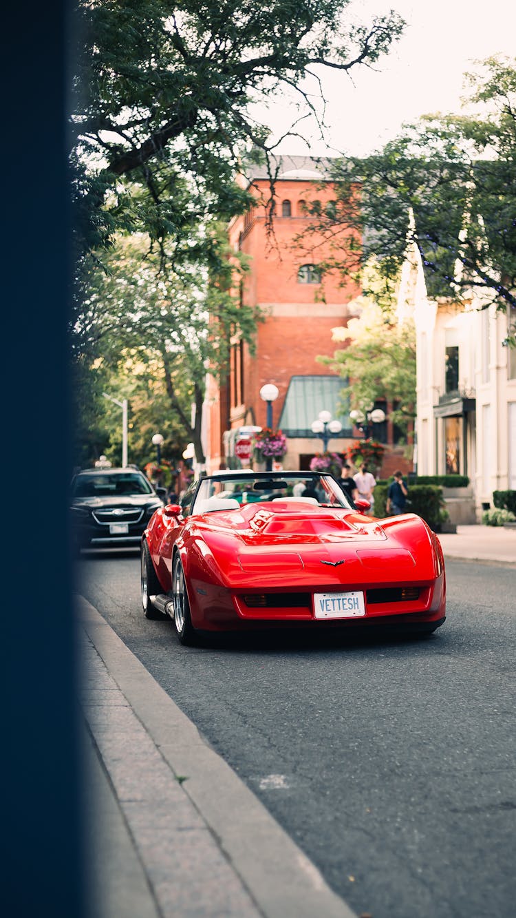 Red Corvette Parked On The Street