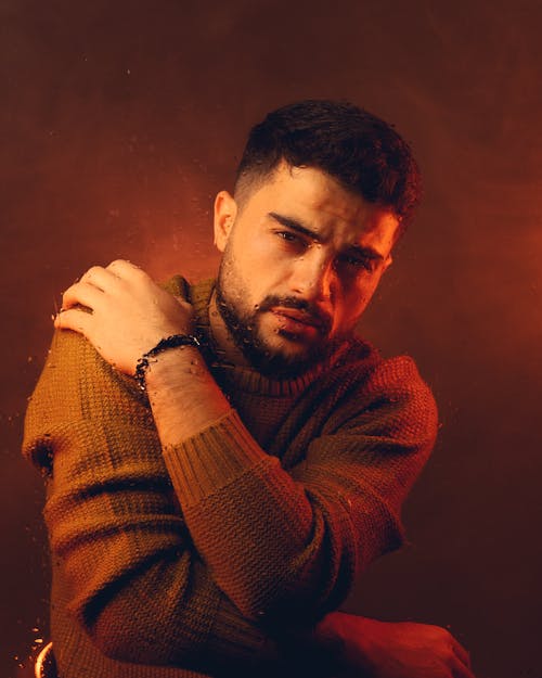 Portrait of Man in Brown Sweater