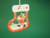Christmas Hanging Sock Decoration on Green Background