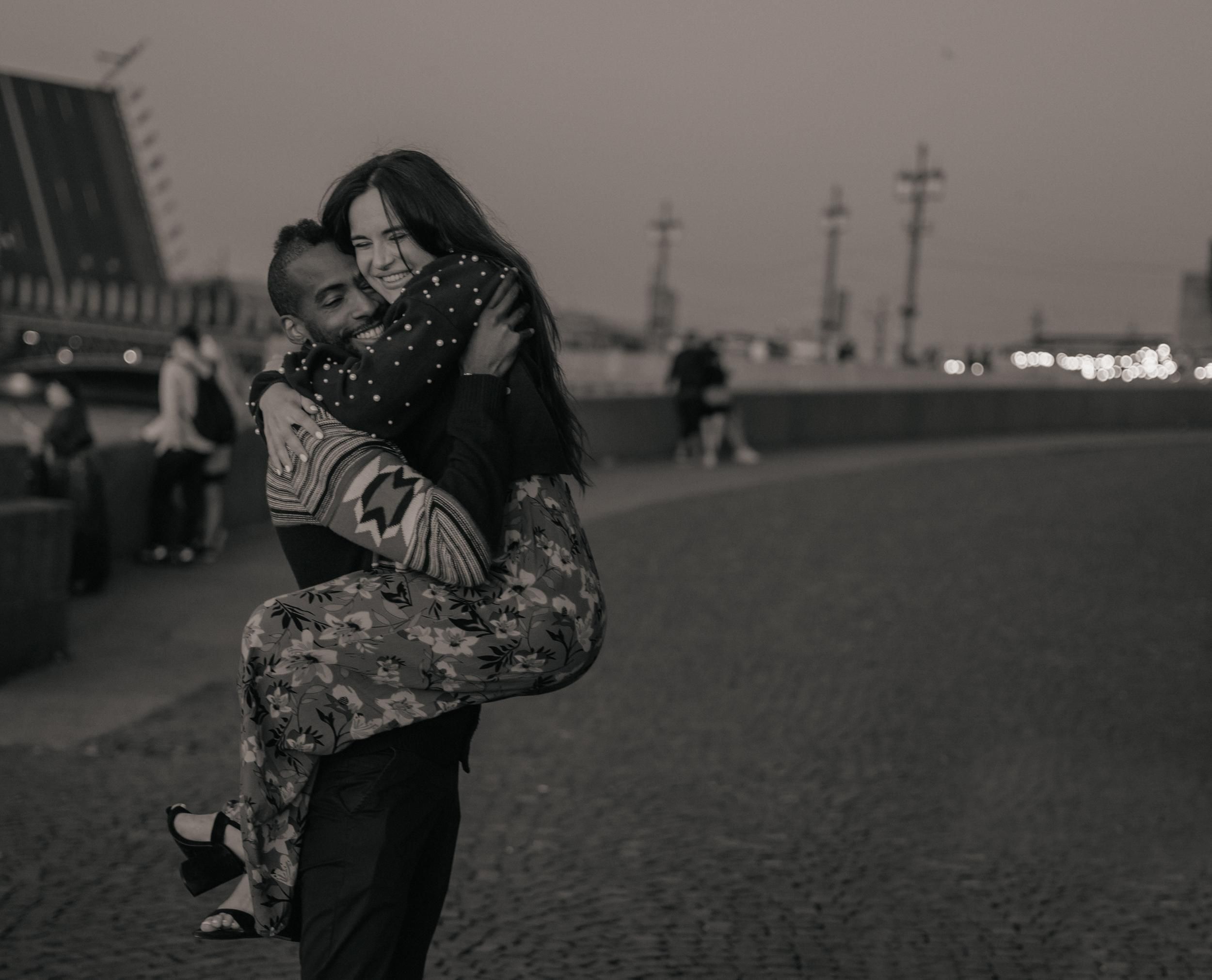 Man Holding Woman in his Arms · Free Stock Photo