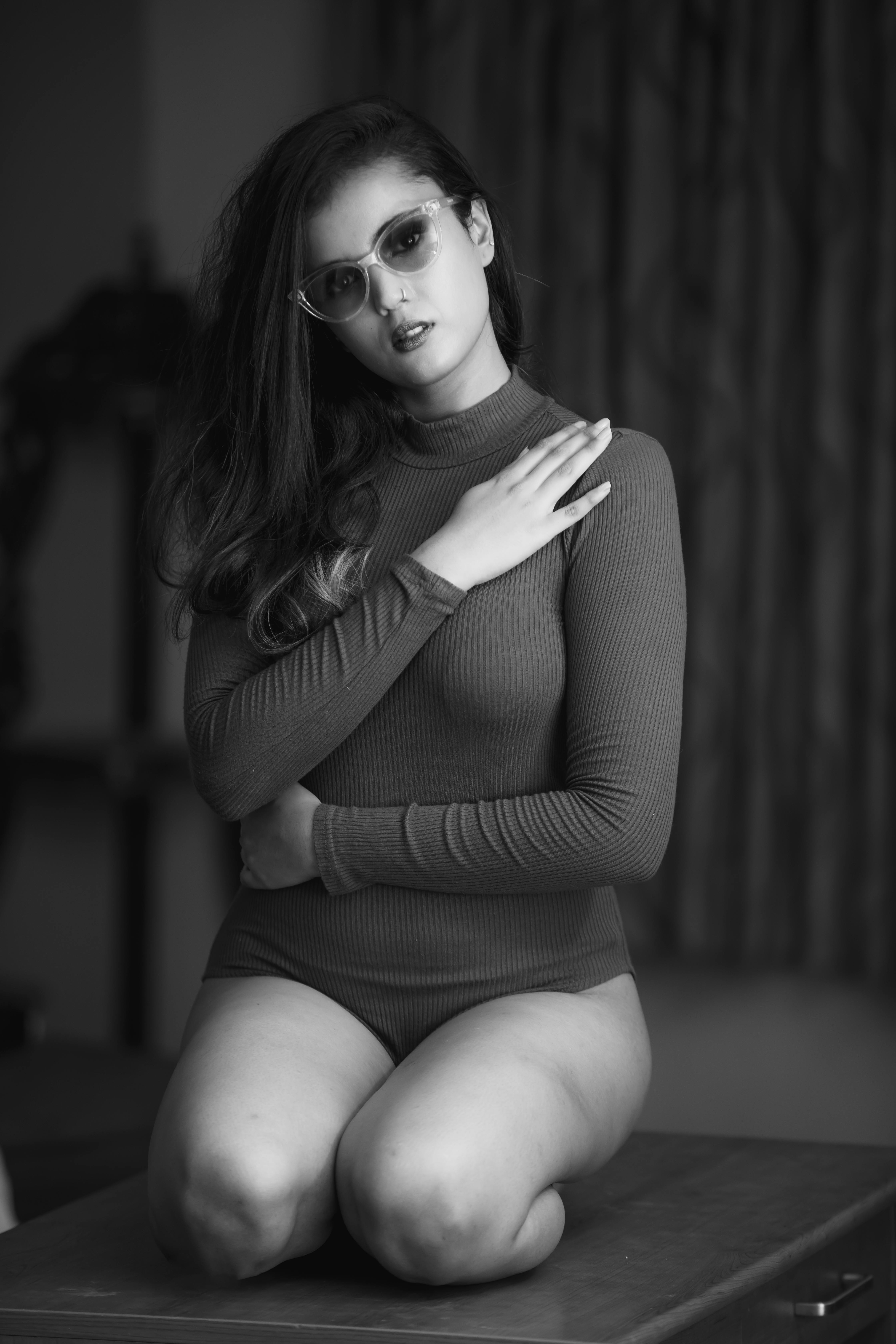 Woman in Sexy Bodysuit Posing in Bathroom · Free Stock Photo