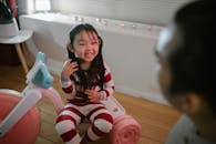 Girl Sitting and Smiling