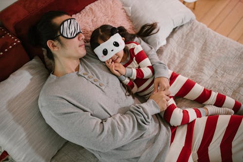 Free Father and His Child Bedtime Stock Photo