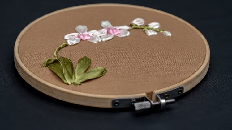 Close Up Of An Embroidered Flower