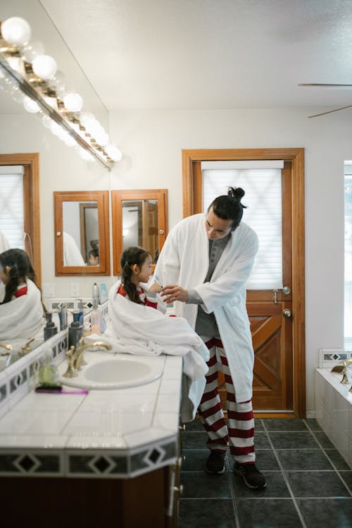 Father Teaching Child Morning Routine